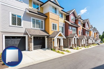 a row of townhouses with New Mexico map icon