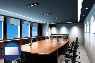 an executive conference room with North Dakota map icon