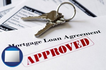 an approved mortgage loan agreement with Wyoming map icon