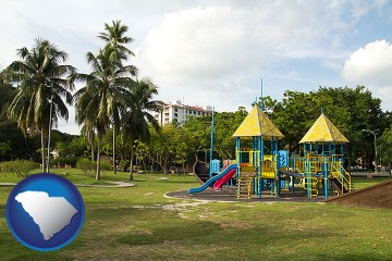 a tropical park playground with South Carolina map icon