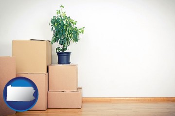 an unfurnished apartment with moving boxes with Pennsylvania map icon